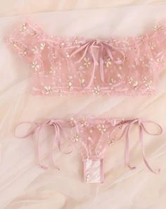 This Pink Sheer Bralette Lingerie is a must-have for any lingerie collection. Made from high-quality sheer fabric, it offers both style and comfort. The delicate pink color adds a touch of femininity, and the bralette design provides a flattering and supportive fit. Elevate your intimate wardrobe with this comfortable and alluring set. Lingerie Bralette, Sheer Bralette, Lingerie Catalog, Pink Sheer, Pink Bralette, Sheer Fabric, Lingerie Collection, Color Rosa, Sheer Fabrics