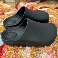 Style No. 78480605; Color Code: 024 Perfect For Post-Workout, These Easy Slip-Ons Feature A Sleek Pvc Upper And Lugged Sole For A Comfy, Pre-And-Post-Workout Pair. Features: Slip-On Style, Backless Design, Clog Construction, Pvc Uppers, Round Toe, Lugged Sole Why We <3 It: These Shoes Are The Perfect Pair To Slip On After The Gym. Brand New-Never Worn! Size Small (5/6) Casual Platform Slippers With Round Toe, Casual Non-slip Platform Slippers With Flat Heel, Casual Slip-on Platform Slippers With Round Toe, Black Slip-on Slide Mules, Black Non-slip Round Toe Platform Slippers, Synthetic Slip-on Platform Slippers With Rubber Sole, Black Slip-on Platform Slippers, Casual Black Slip-on Platform Slippers, Black Non-slip Synthetic Platform Slippers