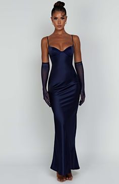 Capture all attention in Athena, our stunning floor-sweeping maxi cut from premium bias cut stretch satin which gives a beautiful drape and skims over the figure. With a body-hugging fit youÃƒÂ¢Ã¢â€šÂ¬Ã¢â€žÂ¢ll adore, the look is complete with thin straps and a zipper to the reverse. Stun them by styling Athena with sleek hair and the mesh Eli gloves.



Colour: Navy.

Luxury bias cut, stretch satin.

Thin straps.

Drapes over the body.

Figure hugging.

Zipper to reverse.

Maxi length.



Mode Body Hugging Prom Dress, Navy Blue Wedding Dress Bridesmaids, Navy Blue Dress Aesthetic, Frosh Dresses, Navy Dress Accessories, Midnight Blue Prom Dresses, Long Navy Dress, Bday Dresses, Blue Dress Accessories