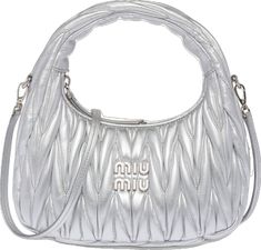 Formal Silver Bags With Logo Hardware, Silver Bags With Logo Hardware For Formal Occasions, Modern Silver Shoulder Bag With Logo Hardware, Silver Shoulder Bag With Top Handle And Silver-tone Logo, Luxury Silver Bag With Logo Hardware, Formal Silver Shoulder Bag With Logo Hardware, Silver Evening Shoulder Bag With Logo Hardware, Silver Crossbody Shoulder Bag With Silver-tone Logo, Designer Silver Bags With Logo Hardware