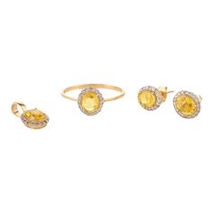 This is part of Chairish’s Fine Jewelry assortment.  Yellow Sapphire and Diamond Halo Ring, Pendant and Earrings Jewelry Set 18K Gold to make a statement with your look. You shall need these to make a statement with your look. These create a sparkling, luxurious look featuring oval cut yellow sapphire and diamond. Sapphire stimulates concentration and reduces stress. Designed with oval cut yellow sapphire with halo of diamonds set in prong setting with a diamond making a ring, pendant and earring in solid gold. This beautiful handcrafted yellow sapphire jewelry set are perfect Father Daughter Gift, Bridesmaid Gifts, Valentine Gift, Gift for Sister, Mother Daughter Gift, Girlfriend Gift, Gift For Her, Anniversary Present, Gift For Love or any Holiday Gift for Mother, Sister, Daughter, Grand Yellow Sapphire Jewelry, Sapphire Jewelry Set, Father Daughter Gifts, Pendant Ring, Mother Daughter Gifts, Diamond Halo Ring, Gift Girlfriend, Halo Pendant, Ring Pendant