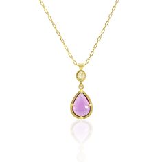 A gorgeous 2.49 ct Pink Tourmaline hand set in 18k Yellow Gold held in place with four delicate prongs. A single yellow diamond accents the pink tourmaline. 18k Yellow Gold Pink Tourmaline Yellow Diamond 16" 18k Yellow Gold Chain Satin Finish 2.49 ct Pink Tourmaline .14 ct Yellow Diamond Style gc469-11-1126 Luxury Tourmaline Jewelry With Prong Setting, Elegant Yellow Gold Pear-shaped Gemstones, Elegant Pear-shaped Yellow Gold Gemstones, Elegant Round Pink Sapphire Gemstones, Yellow Gold Briolette Gemstones For Formal Occasions, Elegant Pink Sapphire Gemstones Gift, Formal Yellow Gold Briolette Gemstones, Luxury Kunzite Jewelry With Accent Stones, Formal Teardrop Tourmaline Jewelry