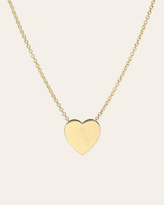 Classic and uber chic 14k gold heart on a dainty cable link chain necklace. Effortlessly chic, a timeless necklace that also makes the perfect gift! Made in L.A. 14k Solid Gold Size: Approx. 12mm Ships in 5-7 business days Rush orders ship in 2-4 business days Comes gift ready in a custom Zoe Lev jewelry box. *Eligible for return, per our policy. See here for details. Timeless Necklace, Custom Jewelry Box, Large Heart, Link Chain Necklace, Food Cakes, Heart On, Gold Heart, Necklace Sizes, Chain Link Necklace