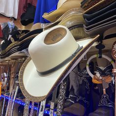 "Really Nice Men's Rodeo cowboy Hat perfect for your next Upcoming Event! Wear to any occasion with A Nice Solid white & brown Color wave easily combinable with any outfit! Featuring a Nice Crown \"Rodeo\" Design perfect for rodeos and more. Made with lightweight & breathable material and has an elastic band for a better comfort fit. Made 100% from Mexico available in all sizes small-Large! Perfect for that Cherry on Top Western! Spanish: ¡Muy bonito sombrero de vaquero de rodeo para hombre, per Rodeo Design, Chapeau Cowboy, Western Hat, Western Cowboy Hats, Rodeo Cowboy, Color Wave, Western Hats, Cowboy Western, Cherry On Top