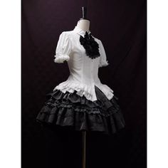 An item that will make you look like a mysterious and elegant young lady. It is richly decorated with lace embroidery and frills, and when paired with a bold chest ornament, it further enhances the gorgeous atmosphere. Like an aristocratic lady from medieval Europe. 
 
 

 

 
 
 
 Item 
 
 Blouse (black) + Jabot (black) 
 Blouse (purple) + jabot (purple) 
 Blouse (white) + Jabot (white) 
 Blouse (white) + Jabot (black) 
 Brooch (black x blue) 
 Brooch ( Black x Red) 
 Brooch ( Black x Purple) Baroque Victorian Dress With Ruffles For Parties, Elegant Fitted Baroque Dress, Elegant Fitted Victorian Dress In Baroque Style, Elegant Victorian Dress With Ruffles And Baroque Shape, Fitted Victorian Dress With Ruffles In Baroque Style, Fitted Feminine Victorian Dress, Fitted Victorian Dress With Ruffles And Overbust, Elegant Victorian Dress Fitted With Ruffles, Fitted Victorian Overbust Dress With Ruffles