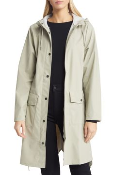 Lightweight and elegant, this trench coat–inspired waterproof jacket seamlessly shields you from the weather without sacrificing your style. 38" length (size Medium) Stand collar Unlined 100% polyester Machine wash, dry flat Imported Modern Outerwear For Spring Rainy Weather, Modern Waterproof Raincoat For Spring, Spring Utility Waterproof Raincoat, Utility Waterproof Raincoat For Spring, Fall Raincoat With Button Closure For Rainy Weather, Fall Raincoat For Rainy Weather, Classic Waterproof Raincoat For Fall, Winter Raincoat With Button Closure, Modern Raincoat For Fall Weather