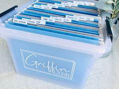 a plastic container filled with lots of files