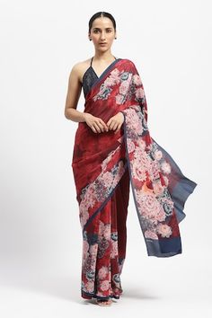 Red, maroon saree with rose print all over. Comes with running blouse piece. - Aza Fashions Red Floral Print Georgette Dupatta, Festive Red Saree With Floral Print, Festive Red Floral Print Saree, Red Silk Saree With Floral Print, Red Floral Print Saree For Wedding, Red Pre-draped Saree With Printed Motifs, Elegant Red Floral Print Dupatta, Red Saree With Printed Motifs For Wedding, Red Wedding Saree With Printed Motifs