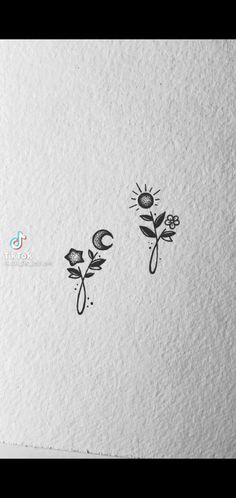 three flowers are drawn in black ink on white paper, with the words love written below them