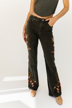 these 90s // y2k-inspired floral embroidered jeans will turn any outfit idea into an on-trend moment. they have a slim, bell bottom // bootcut silhouette + feature flower embroidery along the sides. the perfect y2k jeans to wear with tanks + tees in the spring + summer, or sweaters + coats in the fall + winter. black // flared, one button zip fly, belt loops, pockets, embroidered floral detailing model is 5'8" + wearing a small measurements are approximate + taken while laying flat small : waist Embroidered Pants, Y2k Jeans, Black Flare, Pants Large, Embroidered Jeans, Bell Bottom, Flower Embroidery, In The Fall, Small Waist