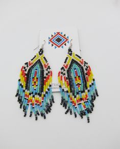 Beautiful Native American Style handmade earrings. Stainless steel ear wires and all made by ethnic artisans. Beautiful new colors and styles for matching regalia or wearing alone. Great price and free shipping! Traditional Colorful Festival Earrings, Southwestern Style Earrings With Round Beads For Festivals, Southwestern Style Round Bead Earrings For Festivals, Southwestern Multicolor Dangling Beads, Multicolor Southwestern Style Dangling Beads, Southwestern Style Multicolor Dangling Beads, Southwestern Multicolor Earrings With Colorful Beads, Southwestern Multicolor Round Bead Earrings, Traditional Multicolor Earrings With Colorful Beads