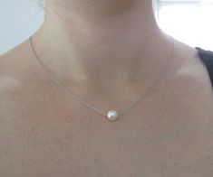 "New from Benati! A extremely elegant freshwater round pearl necklace, floating gracefully on a beautiful solid 14k gold link chain. Crafted to perfection in 14k solid gold. The pearl is hanged on a elegant, delicate and durable, gold links chain (As seen in pictures), approx. width: 1.0 mm (0.039\") chain. You or your friend will look super fine with this new exclusive design - by Benati. The size of the round pearl is approx.: 8 mm round - 0.31\" a very beautiful and high quality freshwater pe Formal Pearl White Chain Necklace With Pearl Pendant, Dainty White Gold Single Strand Pearl Necklace, Elegant Cable Chain Necklace For Wedding, Elegant Wedding Cable Chain Necklace, White Pearl Necklace With Delicate Chain For Formal Occasions, Dainty Formal Chain Necklace With Pearl Drop, Classic White Pearl Drop Chain Necklace, Dainty Pearl Drop Chain Necklace For Formal Events, White Classic Pearl Necklace With Cable Chain