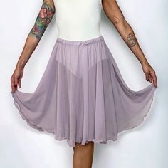 "A full, 360 degree circle skirt with a 1\" fabric covered elastic waistband. Made with high quality, light weight and semi-sheer polyester chiffon. Sizes XS-M are seamless. Sizes L-2XL are constructed in 4 panels" Stretch A-line Gathered Skirt Bottoms, Elegant Fitted Skirt With Elastic Waistband, Elegant Stretch Gathered Skirt, Elegant Stretch Tiered Skirt, Spring Stretch Flared Petticoat, Spring Flared Stretch Petticoat, Dance Skirt Bottoms With Lining, Flexible Dancewear Bottoms For Dance, Stretch Tulle Skirt