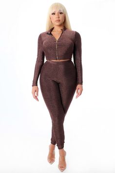 Shimmery, mock kneck, two-piece, long-sleeve two-piece pant set. Stretch material with elastic waist. Fitted Two-piece Set With Long Sleeves, Fitted Two-piece Pant Set With Long Sleeves, Fitted Two-piece Long Sleeve Pant Set, Chic Two-piece Long Sleeve Set, Stretch Long Sleeve Winter Set, Chic Two-piece Set With Long Sleeves, Elegant Two-piece Long Sleeve Sets For Night Out, Two-piece Long Sleeve Pant Set For Loungewear, Two-piece Long Sleeve Loungewear Pant Set