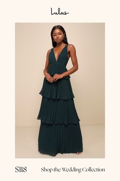 The ambiance of any room will be instantly more elegant when you walk in wearing the Lulus Mesmerizing Essence Emerald Pleated Backless Tiered Maxi Dress! Airy pleated woven chiffon shapes a sleeveless bodice with a flirty V-neckline and slender tying straps that secure above an even flirtier open back, all supported by wide shoulder straps. The flattering, empire-style waist tops a sweeping maxi skirt adorned with flouncy tiers throughout the A-line silhouette. Hidden back zipper/clasp. Fit: This garment fits true to size. Length: Floor length. Size medium measures 61.50" from shoulder to hem. Bust: Great for any cup size. Waist: Fitted - very fitted at natural waist. Hip: Not Fitted - room for hips. Undergarments: May be worn with petals, or no bra. Fabric: Fabric has no stretch. Lined. Tiered Pleated Maxi Dress For Party, Pleated Tiered Maxi Dress For Party, Chic Floor-length Pleated Dress, Elegant Flowy Pleated Dress For Party, Formal Tiered Pleated Dresses, Elegant Tiered Maxi Dress For Date Night, Chic Chiffon Pleated Dress With Pleated Bodice, Chic Pleated Chiffon Dress With Pleated Bodice, Chic Chiffon Pleated Dress