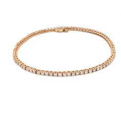 Simple and brilliant, this classic tennis bracelet features 81 round, brilliant diamonds framed in 14k Rose gold. Length: 7 inches Width: 1.90 mm Timeless Rose Gold Tennis Bracelet With Diamond Accents, Timeless Rose Gold Round Tennis Bracelet, Classic Pave Setting Tennis Bracelet, Timeless Rose Gold Diamond Bracelet With Prong Setting, Timeless Rose Gold Tennis Bracelet With Single Cut Diamonds, Rose Gold Diamond Bracelet With Round Cut, Rose Gold Diamond Tennis Bracelet With Prong Setting, Rose Gold Diamond Tennis Bracelet With Jubilee Style, Rose Gold Round Cut Diamond Tennis Bracelet