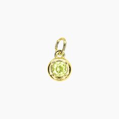 This Brilliant Cubic Zirconia Charm is inspired by the concept of birthstones, precious stones that correspond to different birth months. This 14k gold-plated design features a single, brilliantly cut crystal in a sparkling diamond-faceted style. A great gift for a friend or loved one, this pendant is a chic choice for every day, you can order other birthstones for even more customization. Also available in Silver *Birthstone Charm only - chain not included. PRODUCT DETAILS Pendant Diameter: 1/4 Gold Jewelry With Bezel Setting For May Birthstone, May Birthstone Yellow Gold Faceted Jewelry, May Birthstone Faceted Yellow Gold Jewelry, Yellow Gold Faceted Jewelry For May Birthstone, Faceted Yellow Gold Jewelry For May Birthstone, Yellow Birthstone Jewelry In Cubic Zirconia, Yellow Cubic Zirconia Birthstone Jewelry, Peridot Birthstone Jewelry Gift, Gold Birthstone Necklace With Charms For May