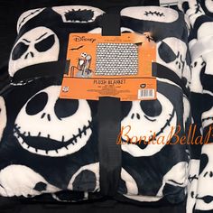 the blanket has been wrapped in black and white fabric with jack skellings on it