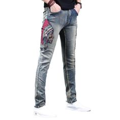 Jeans embroidered with indian online. Excellent jeans from the 2022 Spring collection. Fashion style clothes help you to express yourself through aesthetic choices in clothing. Blue color denim is the most popular denim color, practically suits all other clothes. Embroidered pattern denim can go with anything, and all you need is to pair the patterns the right way. The skinny fit type doesn't restrict movements, and it let you feel free. A mid-waist where the waistband falls slightly above the w Embroidered Denim Blue Jeans For Streetwear, Embroidered Straight Leg Denim Blue Jeans, Trendy Embroidered Mid-rise Jeans, Spring Embroidered Jeans For Streetwear, Trendy Embroidered Denim Jeans, Embroidered Cotton Jeans In Denim Blue, Embroidered Denim Blue Cotton Jeans, Embroidered Straight Leg Jeans For Streetwear, Trendy Embroidered Fall Jeans