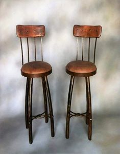 woodland rustic bar chairs with leather seats, iron frames and wood seat back - Custom made in the USA - Your Western Decor Cowhide Upholstery, Rustic Bar Stools, Rustic Bar, Furniture Catalog, Hand Forged Iron, Patina Finish, Bar Chair, Swivel Seating, Bar Height