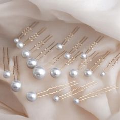 ✨ Add Timeless Elegance to Your Bridal Look with Our Pearl Hair Pins Set! ✨ ️ Searching for the perfect touch of sophistication for your special day? These stunning Pearl Hair Pins are just what you need to elevate your bridal hairstyle with effortless grace and charm. 💖 💎 Why You'll Love Them: Featuring a mix of delicate pearl sizes for a natural, elegant look. Ideal for wedding day hairstyles, from updos to loose curls. 💍 Versatile and perfect for brides, bridesmaids, and special occasions. Pearl Hair Accessories, Pearls Hair, Hair Accessories Bridal, Elegant Wedding Hair, Hair Accessories Pearl, Pearl Pin, Bridal Hairstyle, Pearl Hair Pins, Wedding Pins