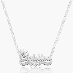 Our popular Double Plated Princess Crown Name Necklace boasts a chic and elegant design, handcrafted to perfection. The model showcases the necklace with an 18-inch Cuban chain (see video for reference). You can personalize this item with Letters, Numbers, and Roman Numerals and choose from chain lengths of 14", 16", 18", and 20". Each chain features a lobster clasp closure for secure wear.Chain width:Cuban Chain - 3.7 mmFigaro Chain - 3 mmRope Chain - 2.3 mm XO Chain - 5 mm Anniversary Nameplate Necklace With Adjustable Chain, Luxury Sterling Silver Name Necklace For Formal Occasions, Luxury Sterling Silver Name Necklace For Formal Events, Luxury Personalized Sterling Silver Charm Necklace, Silver Necklace With Adjustable Chain In 14k Gold, Anniversary Nameplate Charm Necklace With Adjustable Chain, White Gold Nameplate Necklace Fine Jewelry, Personalized Silver Diamond Luxury Necklace, Formal Sterling Silver Name Necklace