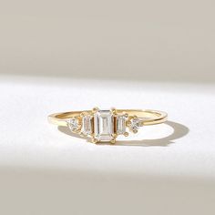 Minimalist Anniversary Rings, Minimalist Rings With Timeless Design For Anniversary, Minimalist Anniversary Rings With Timeless Design, Diamond Rings With Timeless Design, Minimalist Anniversary Ring With Timeless Design, Fine Jewelry Diamond Ring With Timeless Design, Minimalist Emerald Cut Diamond Promise Ring, Minimalist Baguette Cut Diamond Promise Ring, Timeless 14k Gold Cluster Ring For Anniversary