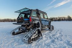 an off road vehicle is parked in the snow