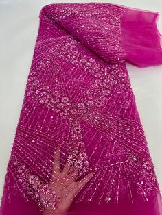 This high quality Fabric is measured in 5 Yards With Embroidered Beading and Sequin. It is soft, very delicate and beautiful. This high Quality Fabric is made with Fashion embroidered rhinestones can be used in making party wedding dresses, skirts, shawls, scarves and other other fashion apparels as you would like. Size : Length : 5 yards (180 inch). Width: 50 inch (Please allow slight deviation for the measurement data ,±1 inch) Material: 100% Polyester, Tulle Lace Fabric, Eco-Friendly embroide Pink Sequin Fabric With Pearl Embroidery For Party, Traditional Pink Sequin Fabric For Wedding, Pink Beaded Embroidered Fabric For Party, Beaded Organza Embroidered Fabric For Wedding, Elegant Pink Embroidered Sequin Fabric, Elegant Pink Sequin Fabric For Celebration, Pink Beaded Lace Embroidered Fabric, Pink Embroidered Fabric With Pearl Detailing For Wedding, Pink Embroidered Fabric With Rhinestones For Wedding