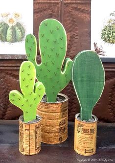 three wooden cactus planters with the words make it yourself wooden cacti for people with a brown thumb