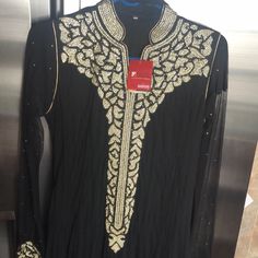 Size 40 Bust 48 Inches Long New Semi-stitched Black Churidar With Self Design, Black Dabka Kurta For Party, Black Long Sleeve Georgette Dress, Fitted Abaya With Dabka Work For Eid, Formal Black Sharara With Dabka Detailing, Elegant Black Churidar For Eid, Fitted Long Abaya For Festive Occasions, Fitted Long Abaya For Festive Season, Fitted Black Abaya For Eid