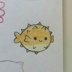 a drawing of a sun and a cat on a white paper with pink marker markers