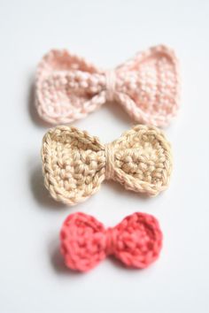 three crocheted bows with the text free pattern