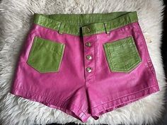 The shorts are crazy cool…. it has that mod pop art look to them. The colors are unbelievable…. the in color of the season, Hot pink leather that is plain. with green parts that is textured in a subtle cricodile look. 60s Shorts, 60s Pop Art, Hot Pink Outfit, Vinyl Clothing, Green Outfit, Mermaid Fashion, Green Shorts, Pink Outfit, Op Art