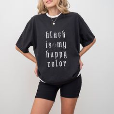 🖤 Celebrate your love for all things dark and mysterious with our goth-inspired tee! Crafted from soft, breathable fabric, this shirt features a bold white print that reads "Black Is My Happy Color," perfect for those who find joy in the shadows. Whether you're channeling your inner goth, making a statement, or simply expressing your unique sense of style, this shirt is sure to turn heads and spark conversations wherever you go. Add a touch of darkness to your wardrobe and let your happy color Black T-shirt With Letter Print For Alternative Fashion, Black Grunge T-shirt For Fall, Black Slogan T-shirt For Fall, Oversized Black Grunge T-shirt, Gothic Black T-shirt For Halloween, Edgy Black T-shirt With Letter Print, Oversized Black Grunge Tops, Black Halloween T-shirt With Text Print, Edgy Black T-shirt With Screen Print