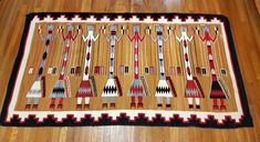 an old native american rug on the floor