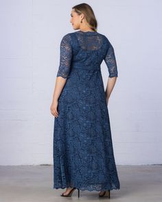 Dressing for a special occasion has never been this easy.  Our Leona Lace Gown is timeless and ideal for weddings, anniversary celebrations and galas. Designed from a soft scalloped stretch lace, this comfortable pull-over gown features 3/4 length sleeves, an illusion boat neck neckline and an A-line silhouette to flatter your curves and make you feel beautiful.  Here's a bonus if you enjoy traveling light. This lovely plus size evening gown has pockets! Made exclusively in women's plus sizes. Formal Lace Dress With Scalloped Lace And Fitted Bodice, Elegant Formal Lace With Lace Bodice, Elegant Formal Lace With Bodice Detail, Elegant Scalloped Lace For Formal Occasions, Scalloped Lace Mother Of The Bride Dress For Party, Bridesmaid Lace Dress With Scalloped Lace And Fitted Bodice, Scalloped Lace Dress For Gala, Scalloped Lace Gala Dress, Formal Dress With Lace Top And Fitted Bodice