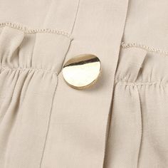 Apricot Button Pleated Long Sleeve Blouse Beige Single-breasted Button-up Top, Neutral Button-up Top With Buttons, Button-up Beige Blouse With Button Cuffs, Chic Beige Tops With Snap Buttons, Spring Beige Blouse With Button Cuffs, Cream Office Blouse With Buttons, Beige Blouse With Button Closure For Fall, Cream Blouse With Buttons For Office, Fall Beige Blouse With Button Closure