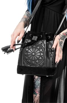 Embrace your inner goth with our goth black sanctum bucket bag. crafted with meticulous attention to detail, this bag seamlessly combines dark aesthetics with practicality. perfect for carrying your essentials, it exudes an aura of mystery and elegance that will make heads turn wherever you go Window Embroidery, Gothic Bag, Rose Window, Pierced Jewelry, Rave Wear, Jewelry Choker, Vintage Wear, Black Rose