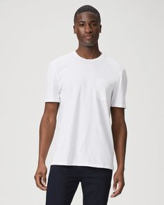 Made from supremely soft 100% cotton with slight stretch and a vintage tee feel, this crew neck tee features a raw edge chest pocket, a slightly curved hem and a center back seam detail. The Ramirez Tee in Fresh White has been pigment washed for a unique look with highs and lows. Wear it on its own or layered under your favorite jacket for an easy weekend outfit. | Ramirez T Shirt - Fresh White | Size Small Weekend Outfit, Vintage Tee, Crew Neck Tee, Raw Edge, Vintage Tees, Chest Pocket, Crew Neck, Top Outfits, Mens Outfits