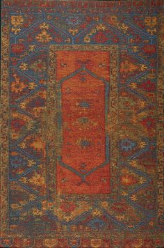 an orange and blue rug with many different colors