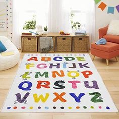 a child's rug with letters and numbers on it