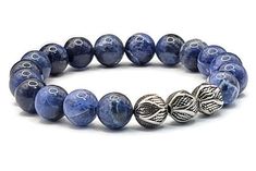 The Sodalite bracelet's high appeal is a result of both the stacked arrangement of the layers and the delicate play with colors.  It is a magnificent work of art that features tons of personality and makes for a cheerful outlook on life This unique bracelet contains high-grade, smooth, round, excellent luster and polish 10 mm Sodalite. 10 mm stainless steel. Sodalite is a deep blue stone with light white veins, reminiscent of a dark stormy ocean.  Strung on a hard black stretch cord for increased strength and durability.  Each piece comes in a delicate pouch. These bags are ideal to preserve the jewel in perfect conditions and are the ideal wrap to present as a gift to that special person. Please contact me via Etsy Conversations with any questions. I love to hear from you! I send the pack Sapphire Lapis Lazuli Bracelets With Round Beads, Sapphire Lapis Lazuli Gemstone Beaded Bracelets, Sapphire Lapis Lazuli Beaded Bracelets, Spiritual Sapphire Beaded Bracelets Hand-strung, Spiritual Sapphire Beaded Bracelets With Natural Stones, Spiritual Sapphire Hand-strung Beaded Bracelets, Spiritual Sapphire Beaded Hand-strung Bracelet, Hand-strung Sapphire Beaded Bracelets, Healing Blue Stackable Bracelets