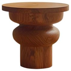 a wooden table that is made out of wood and has a round top on it