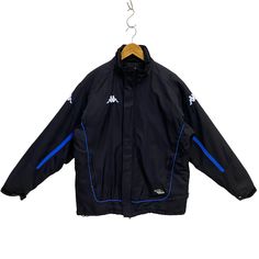 "Vintage Kappa Windbreaker Jacket Kappa Track Top Light Puffer Jacket Athletic Sportswear Kappa Embroidered Logo Black Medium * Used. In fair condition (7/10) minor signs of wear, missing hood. Defective left zipper pocket, broken inside chest pocket and loose thread on velcro (view photos) * Tagged size Medium. Flat laid measurements in inches (appox) - Chest (underarm to underarm) : 23\" - Length (side of neck seam to bottom hem) : 28\" - Shoulder (seam to seam) : 20\" - Sleeve (shoulder seam to cuff end) : 24.5\" BUY 3 ITEMS GET FREE SHIPPING WORLDWIDE ATTENTION : PLEASE READ * SHIPPING via PREMIUM EXPRESS. Delivery about 5 business days to major cities / towns. * SOME REMOTE AREA delivery takes longer. Usually within two weeks after shipped out." Winter Sportswear Sport Coat, Winter Sports Long Sleeve Outerwear, Sporty Long Sleeve Windbreaker For Cold Weather, Sporty Long Sleeve Outerwear For Cold Weather, Sportswear Windbreaker For Winter Sports, Sportswear Long Sleeve Windbreaker For Winter Sports, Long Sleeve Outerwear For Winter Sports, Fleece-lined Windbreaker For Winter Sports, Sporty Long Sleeve Outerwear With Fleece Lining