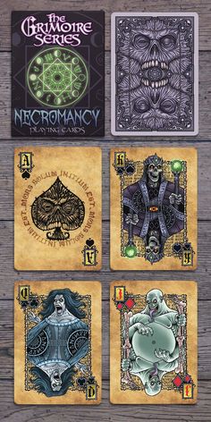 four deck cards with different designs on them