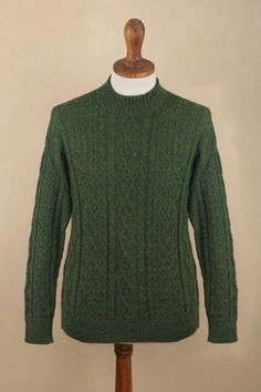 Artisan Wilber Calapuja and his workshop specialize in classic alpaca wool sweaters such as this moss green pullover for men. Calapuja combined his technical training with his memories of his mother's knitting to establish his own workshop after many years of work. Alpaca Wool Sweater, Green Pullover, Alpaca Wool, Moss Green, Wool Sweaters, Pullover Sweater, Alpaca, Pullover Sweaters, Premium Quality