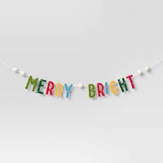 merry bright banner hanging on a string