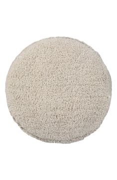 a white round cushion on a white background