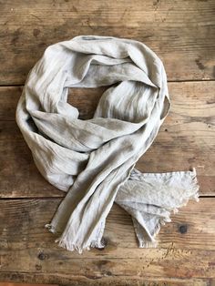 "This is a lovely light linen scarf made from 100% pure linen. The color is between light grey and brown - known also as taupe. It is the color of natural, un-dyed linen. A very nice tone that will match beautifully other earthy and grounded colors in your outfit. Edges are frayed for more casual look and fixed to prevent further fraying. Dimensions: approximately 19\" x 81.8\" [50 x 208 cm] Care instructions: - gentle wash cycle - preferably lukewarm water - straighten and hang to dry - It will Brown Scarf, Simple Scarf, Linen Scarf, Brown Scarves, Linen Scarves, Dyed Linen, Look Plus, Linen Women, Linen Clothes